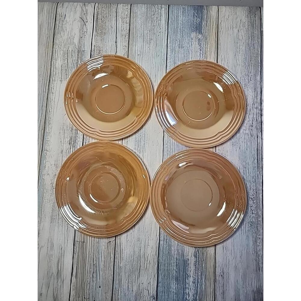 Four Fire King Peach Lustre Saucers